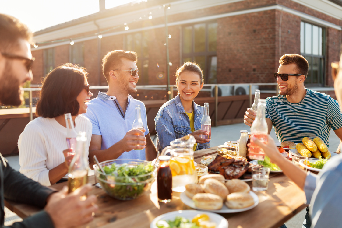 Friends Have Dinner Party on Rooftop